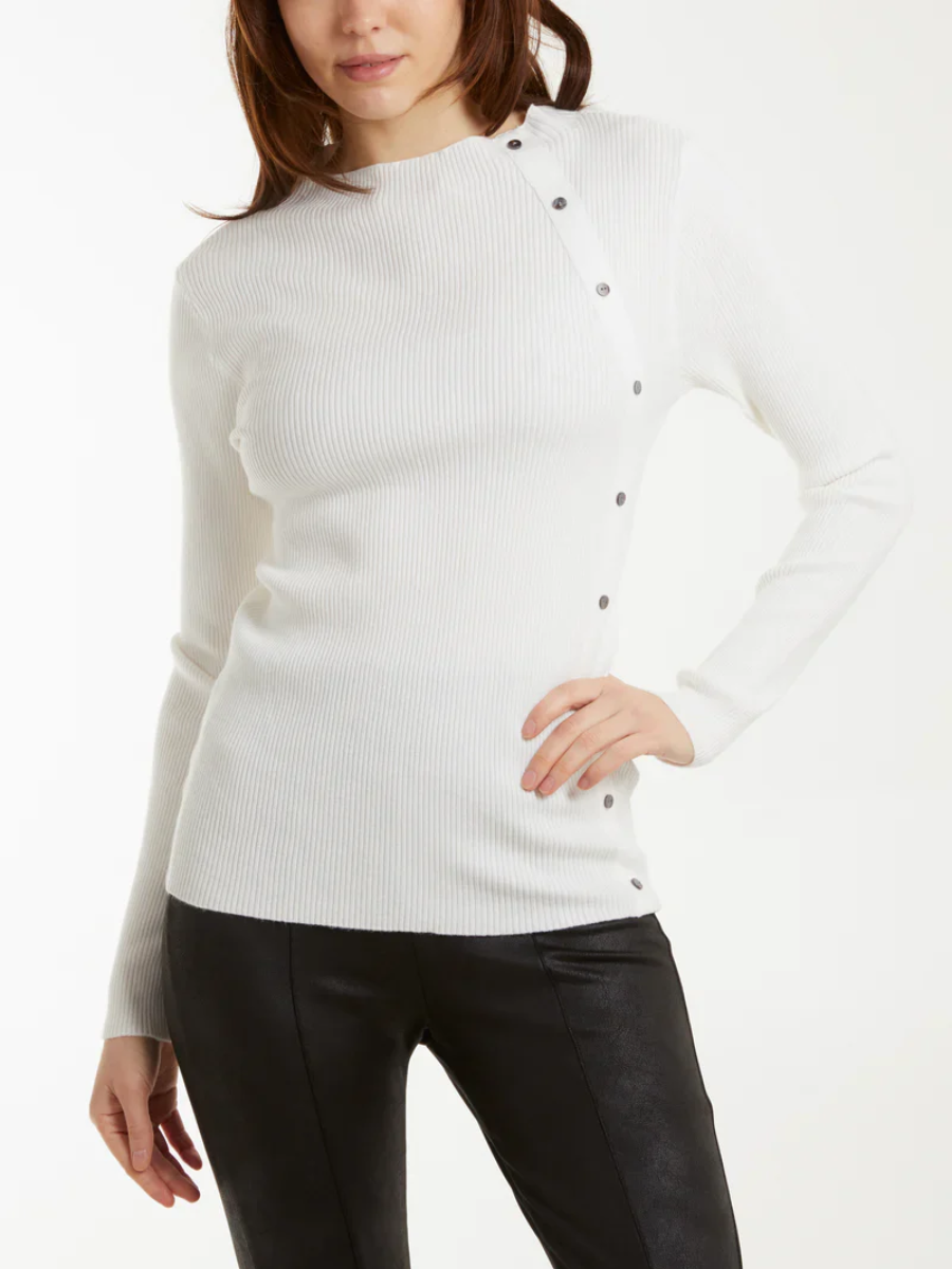 Button detail rib top with a form-fitting silhouette and ribbed texture.