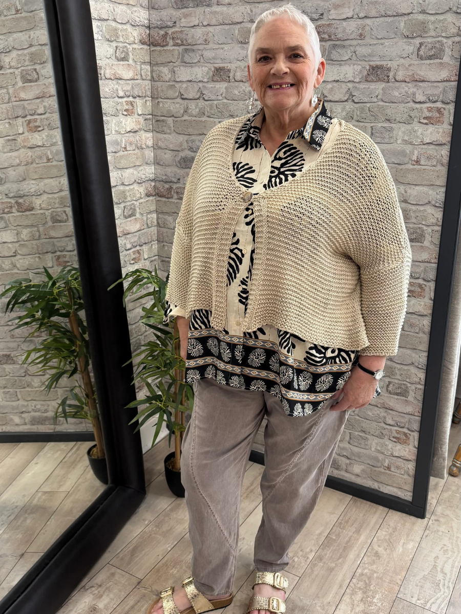 Crochet one button cardigan in beige, perfect for spring and summer layering.