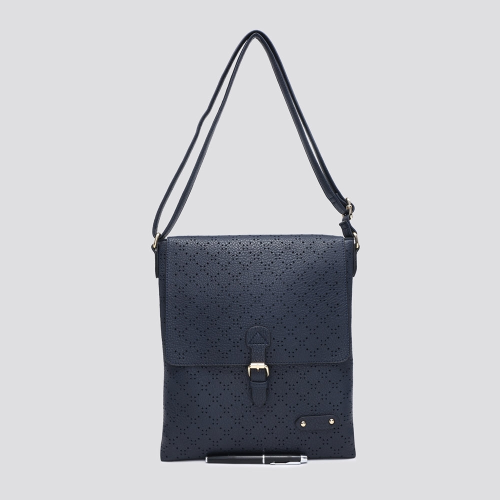 Soft Touch Diamond Perforated Crossbody Bag with vegan leather and gold tone hardware.