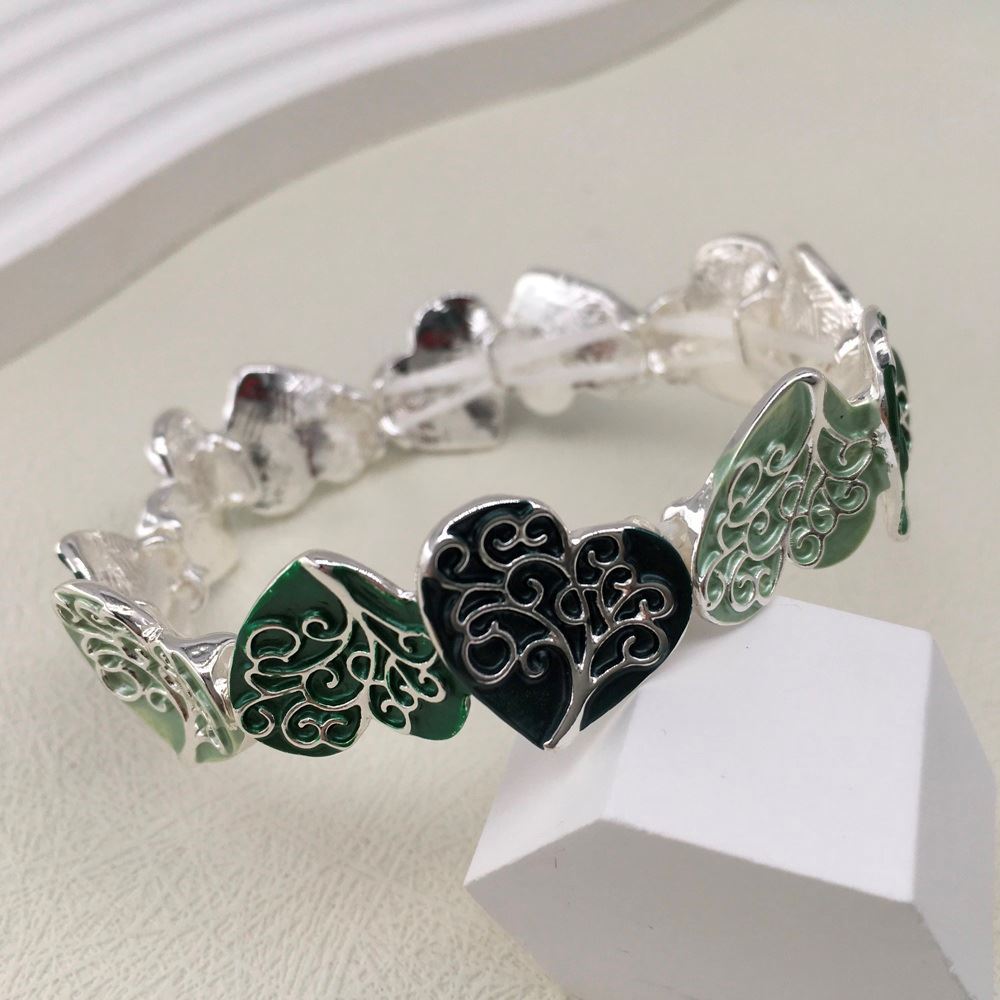 Stretch Bracelet with Heart Design on a display stand.