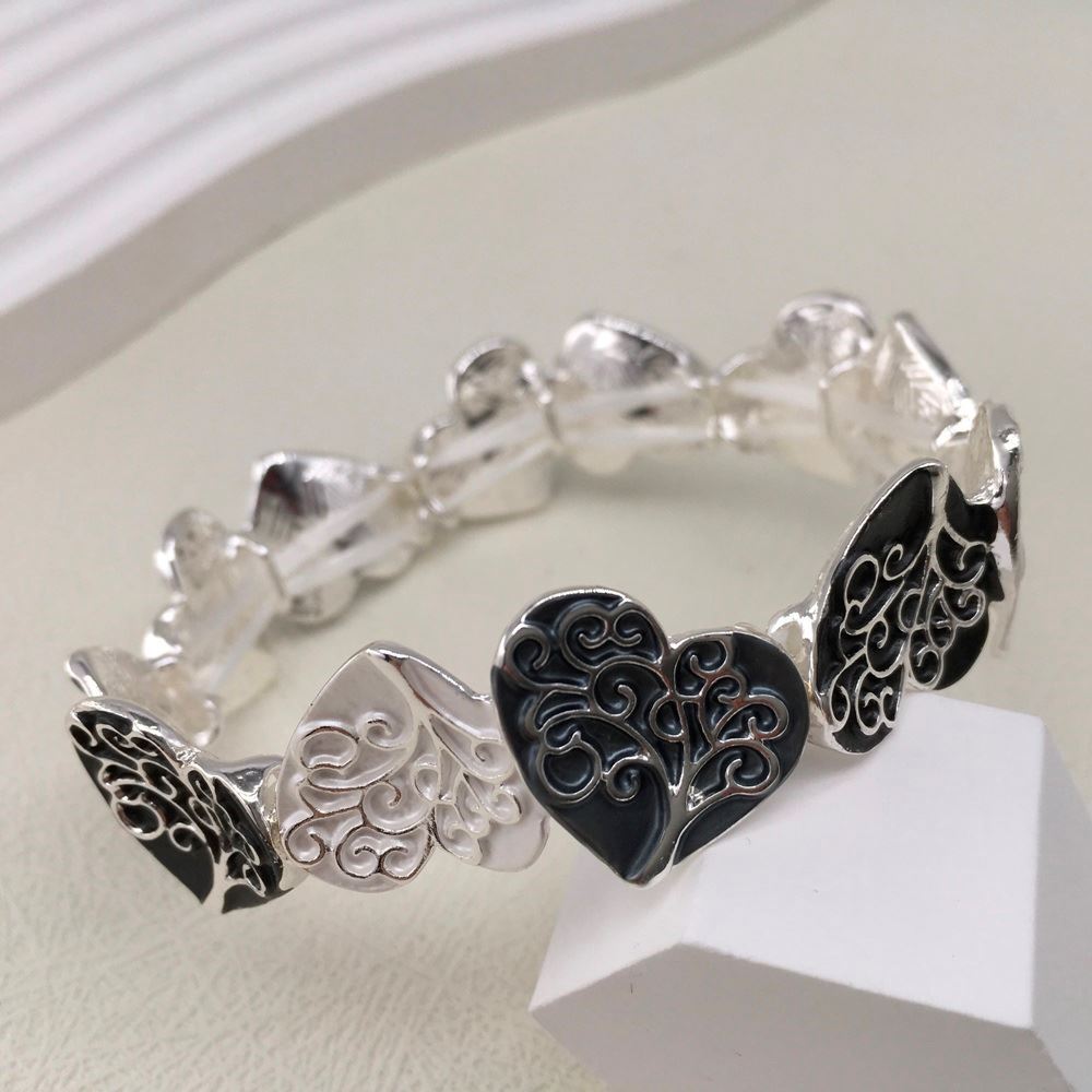 Stretch Bracelet with Heart Design on a display stand.