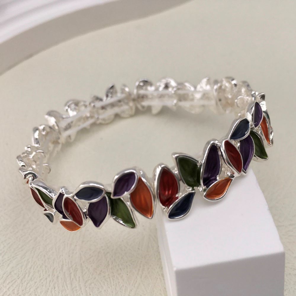 Nickel and lead-free stretch leaf bracelet with colorful leaf design.