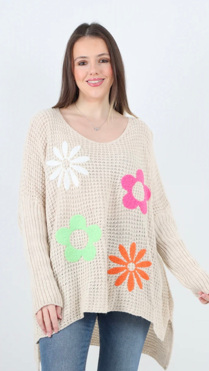 Side Slit Floral Jumper in beige with colorful flower patterns, 100% acrylic.