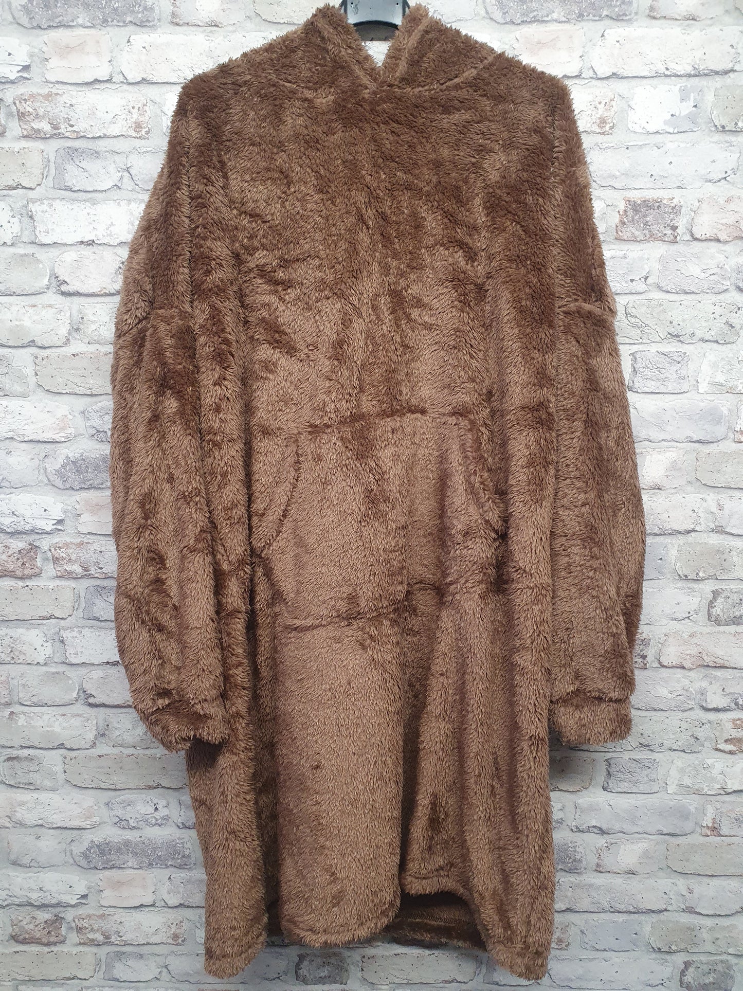 Unisex Blanket Hoodie, soft polyester with hood and pocket, one size fits all.