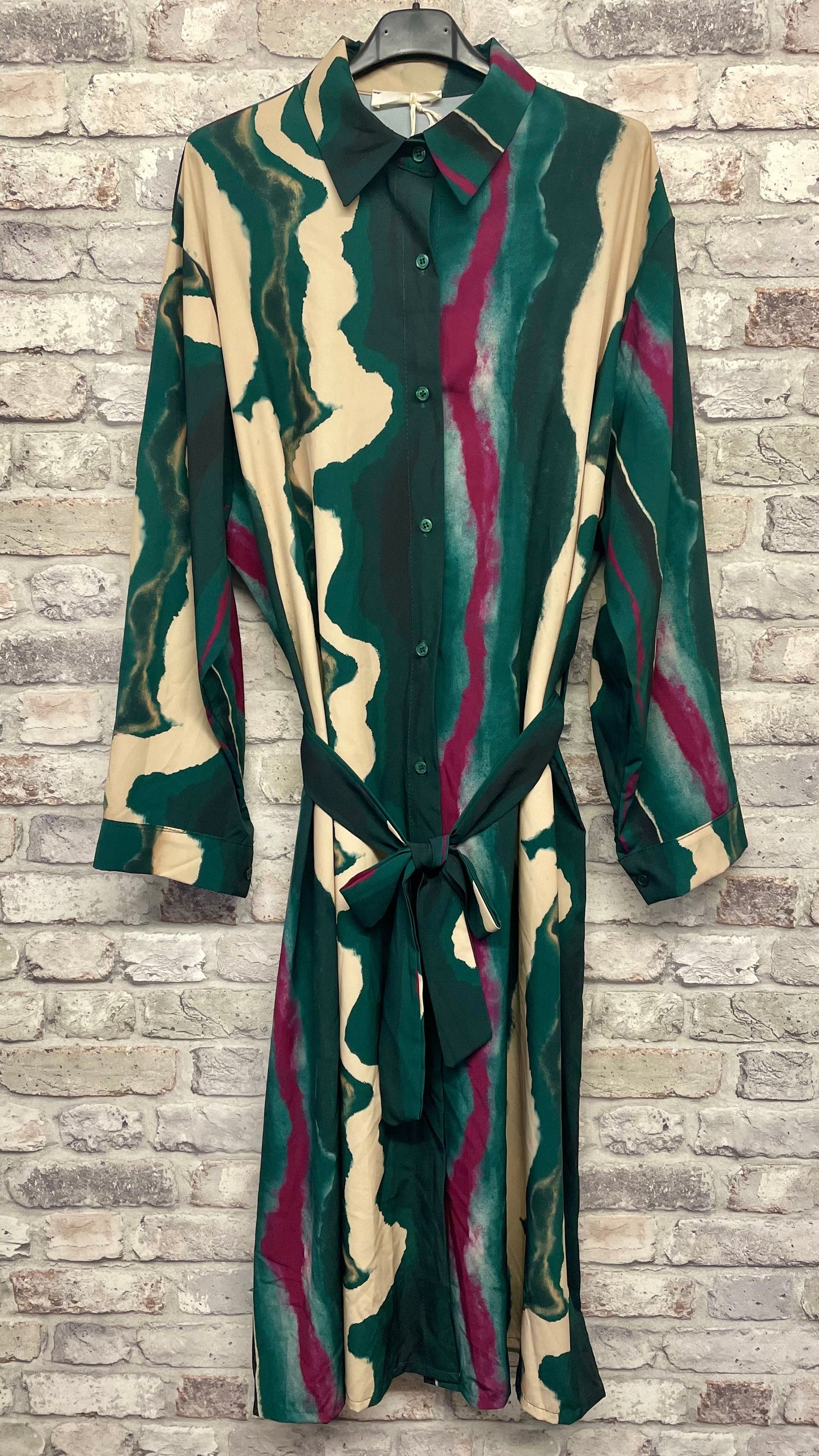 Wave Shirt Dress with abstract pattern in green, beige, and burgundy; 96% polyester, 4% elastane.