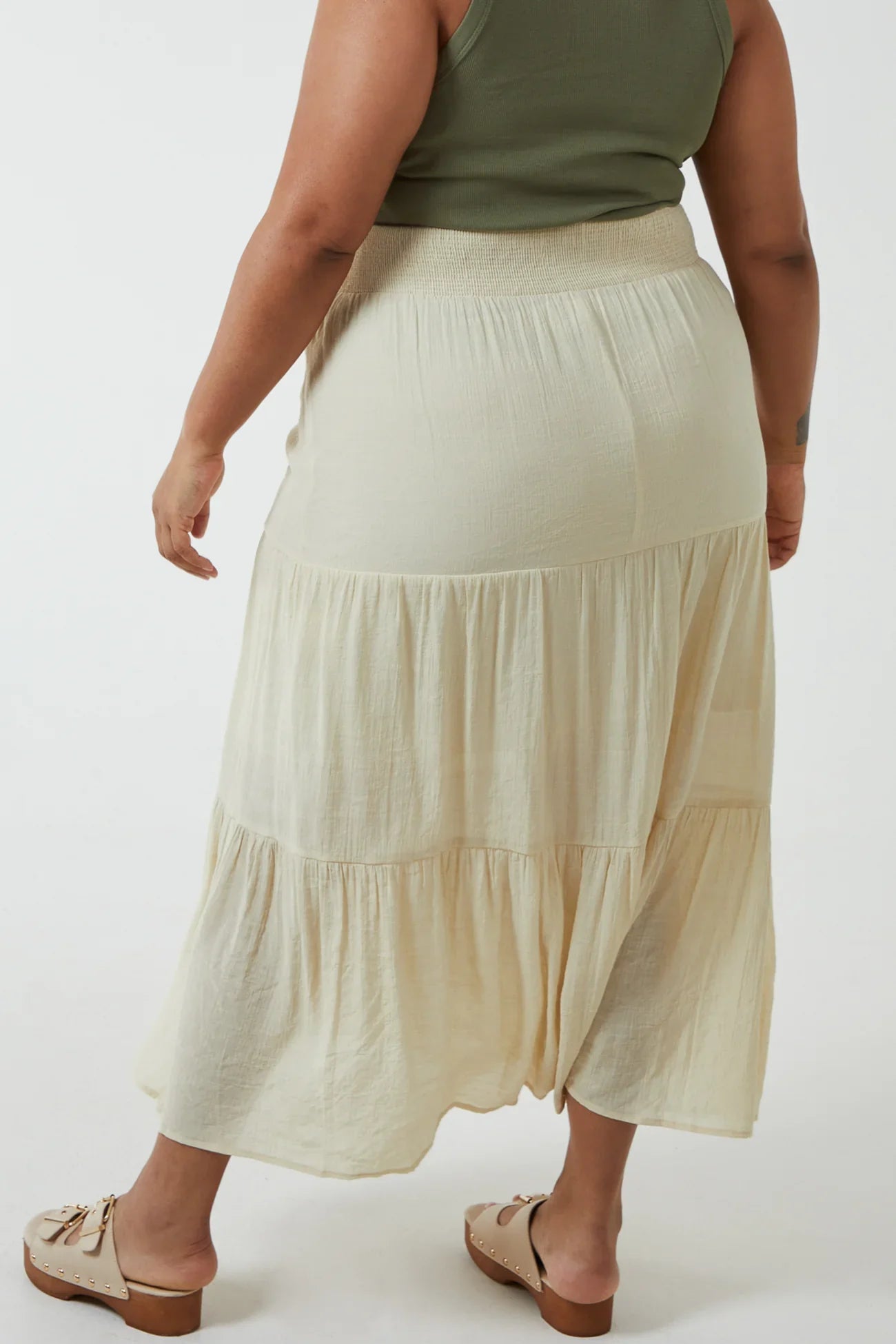 Shirred waist maxi skirt in viscose and polyester, cream color.