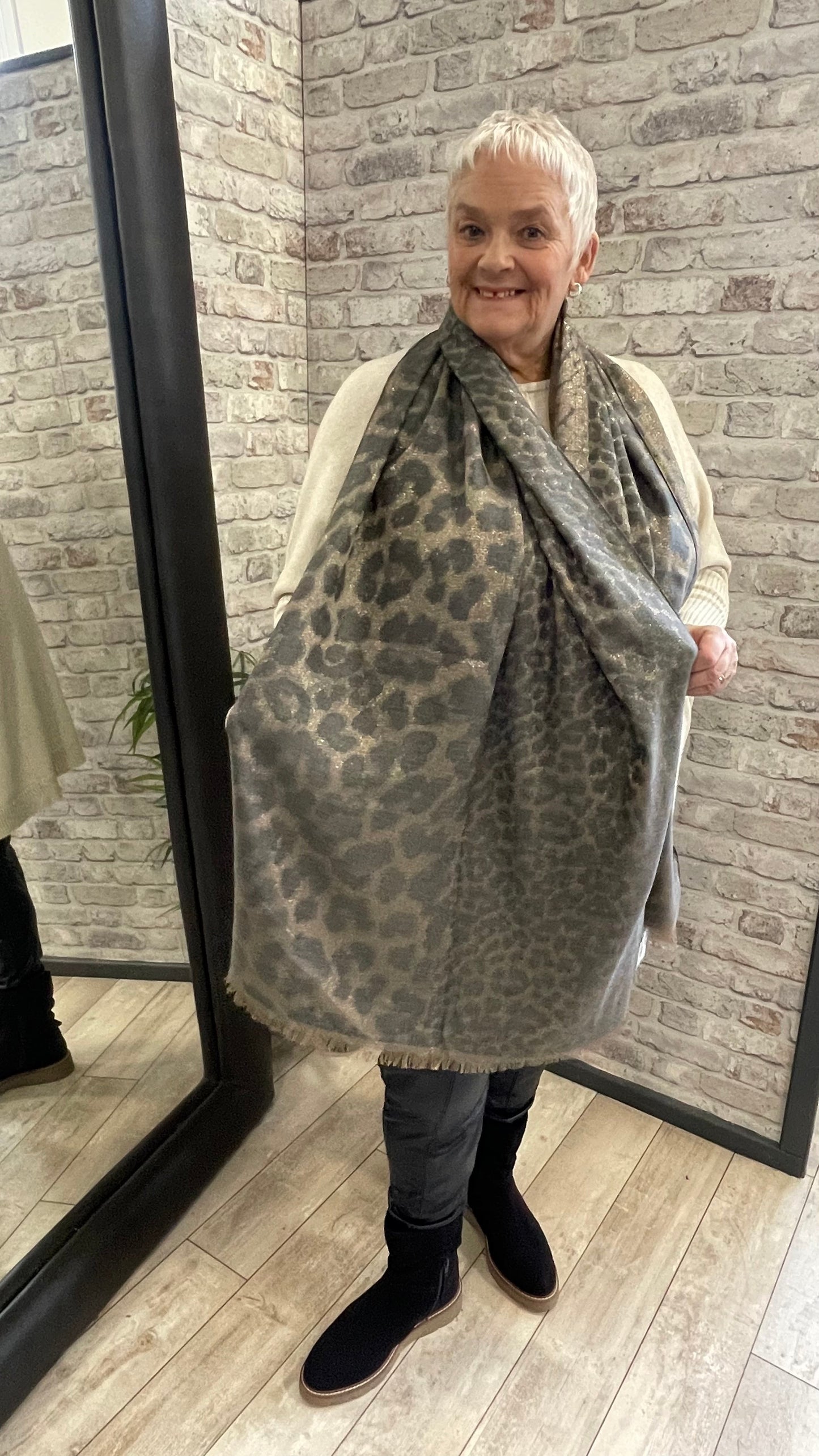 Metallic Animal Luxe Scarf with shiny animal pattern and textured design.