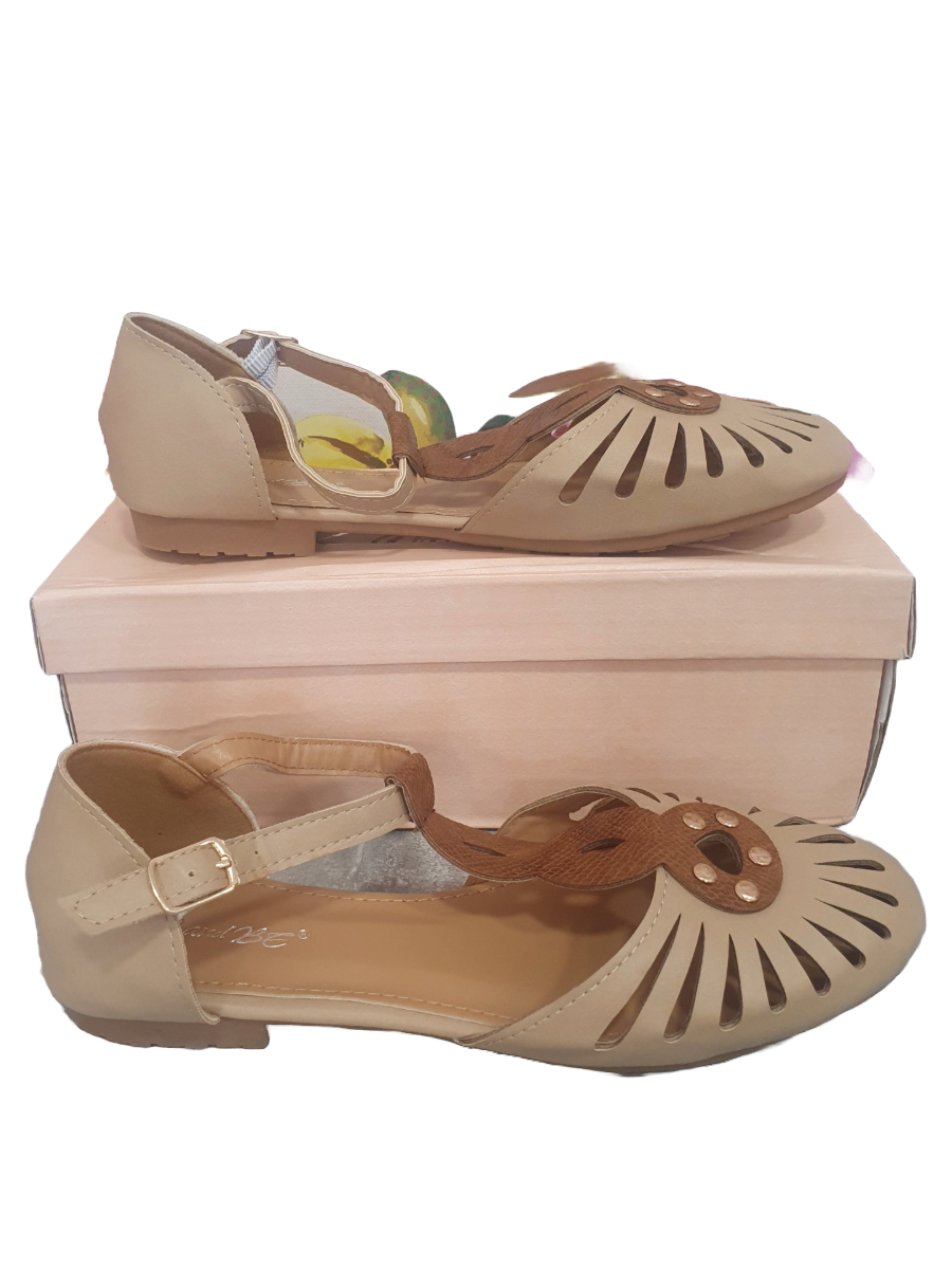 Filigree Ankle Strap Shoes on display box.