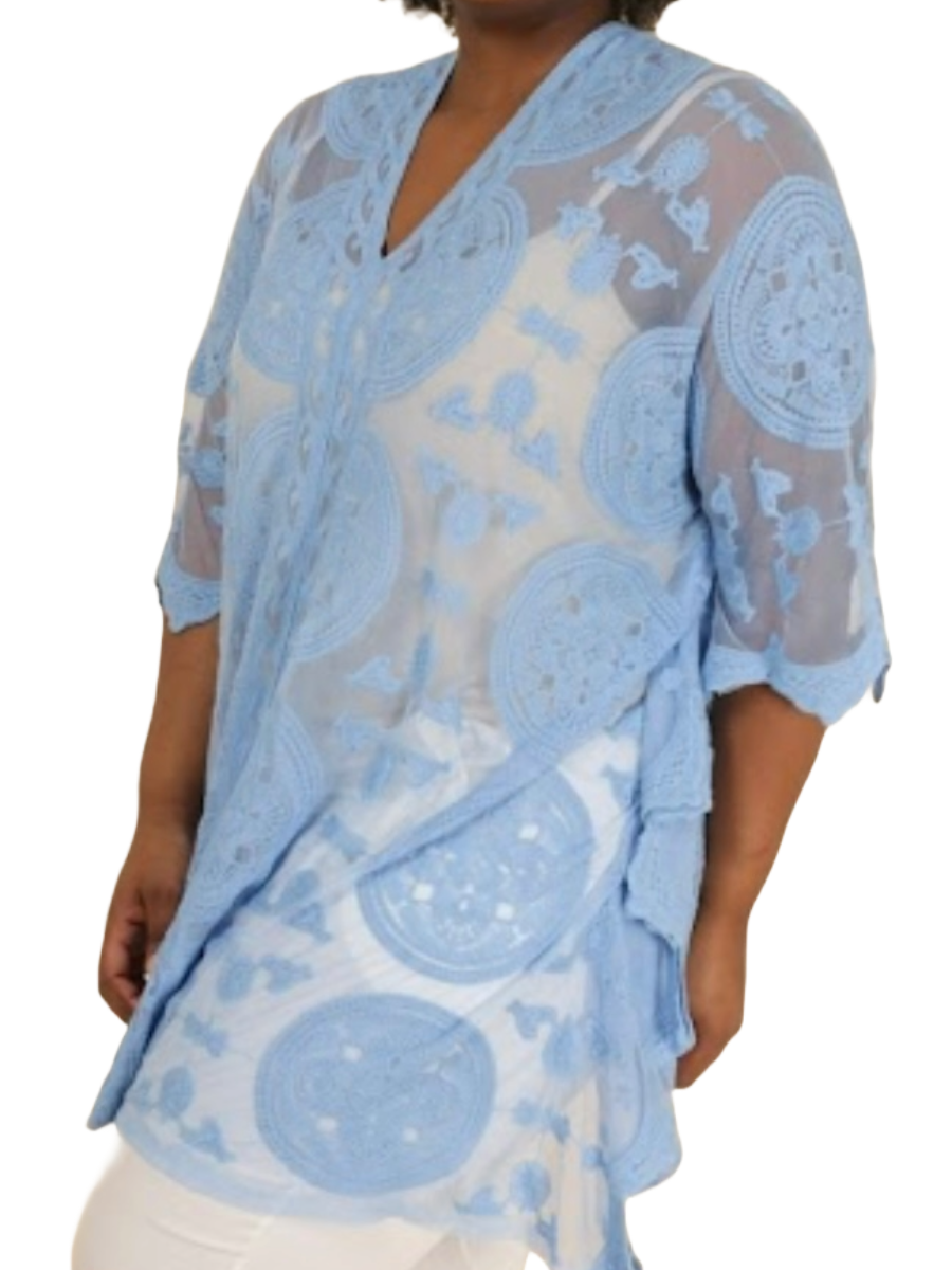 Lace Poncho made of cotton and nylon in light blue.