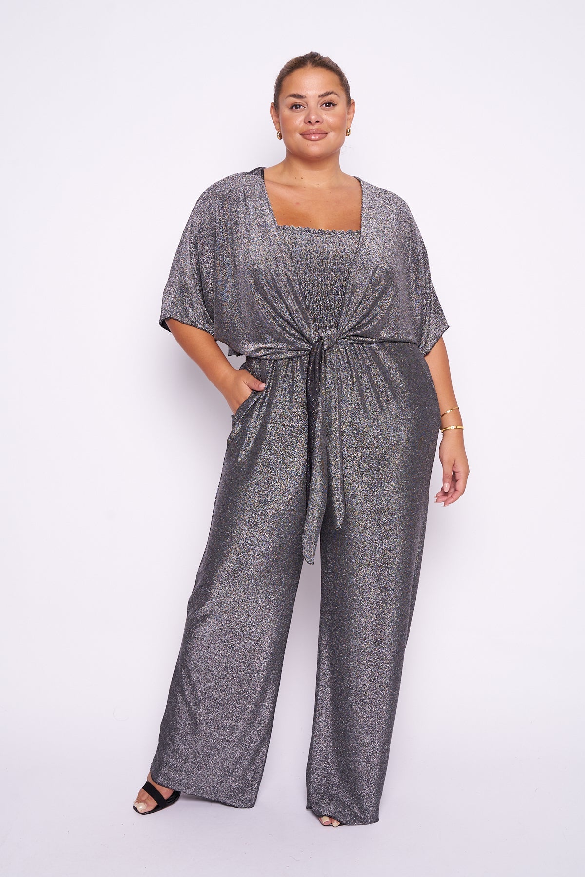 Lurex 2 piece shrug jumpsuit with wide leg and belted wrap style.