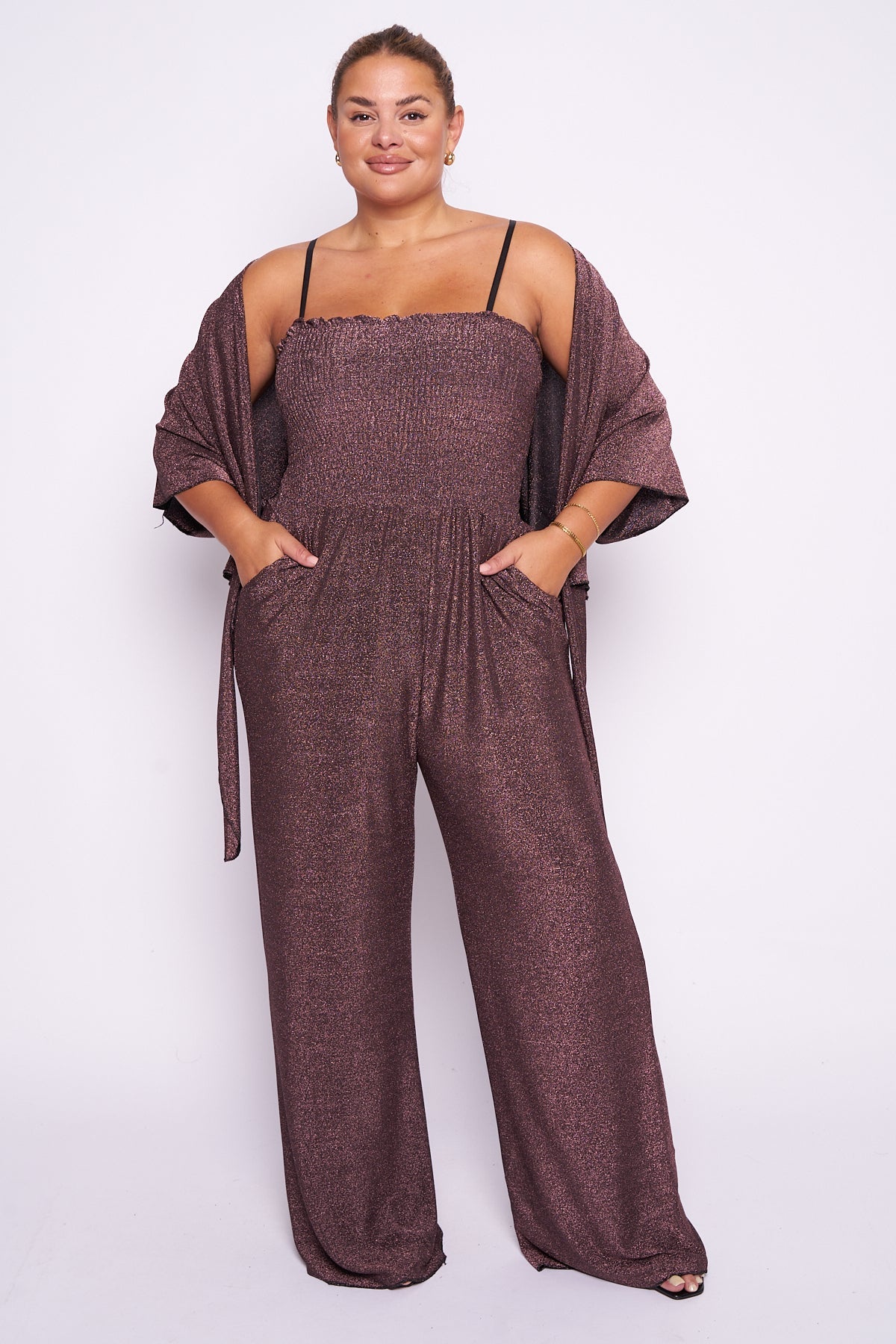 Lurex 2 piece shrug jumpsuit with wide leg and adjustable straps.