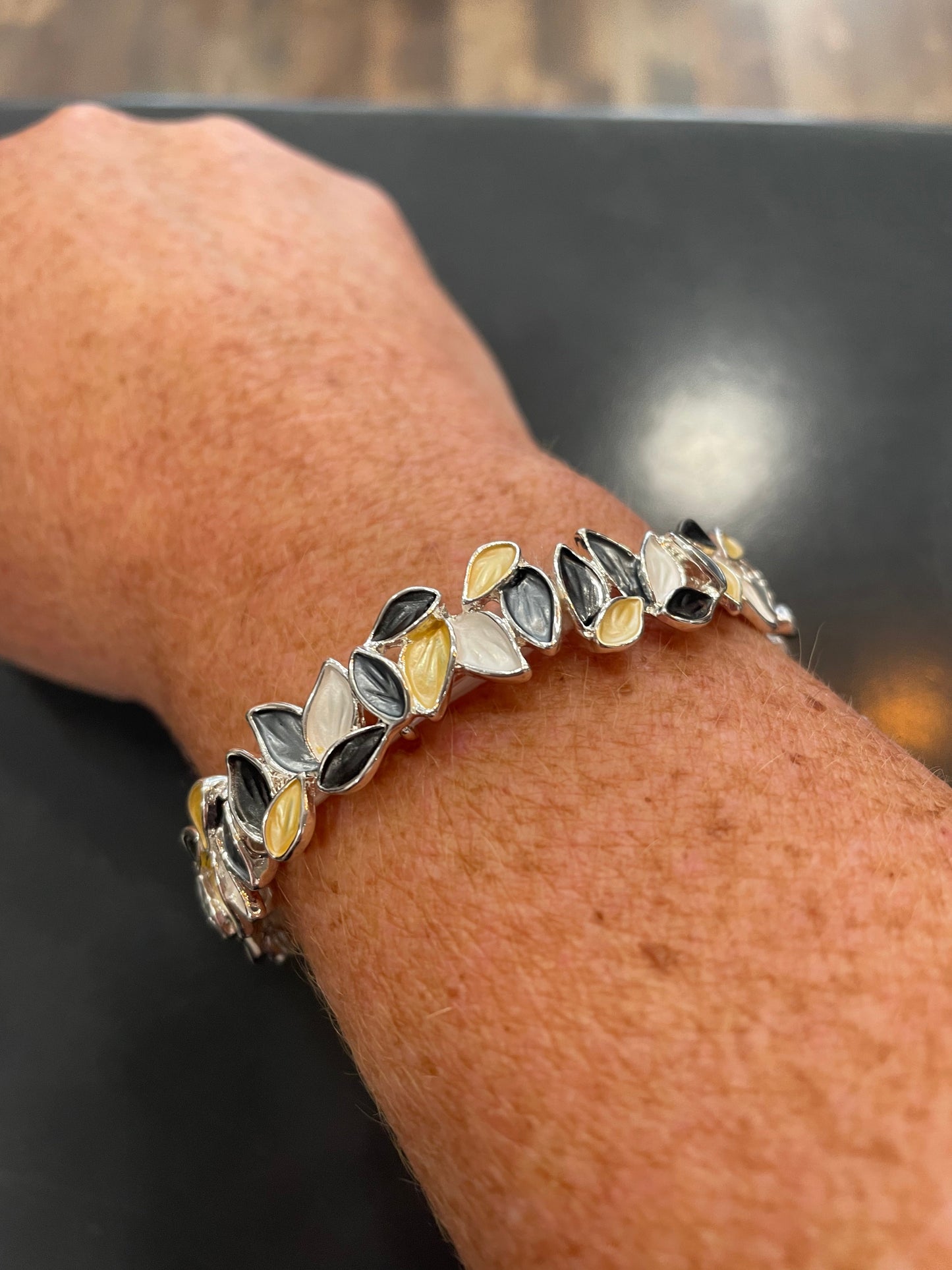 Nickel and lead-free stretch leaf bracelet on wrist.