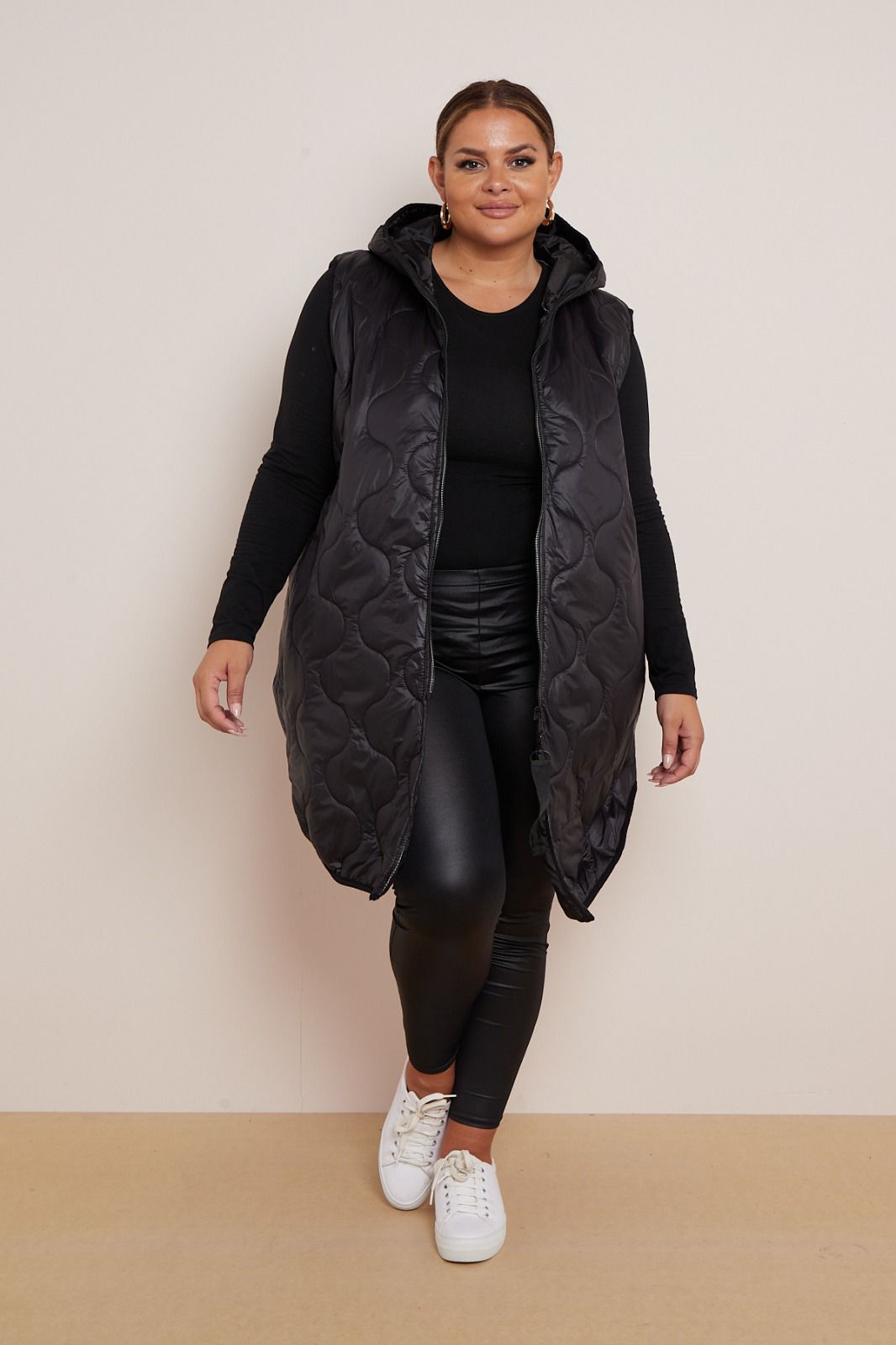 Lightweight padded gilet in black, suitable for sizes 8-24.