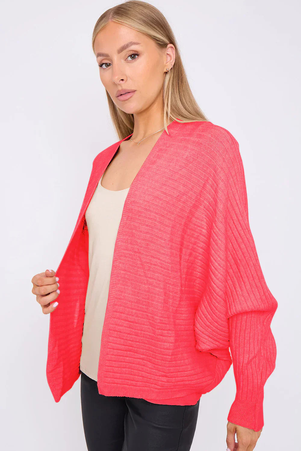 Ribbed batwing cardigan with open front and batwing sleeves in vibrant color.