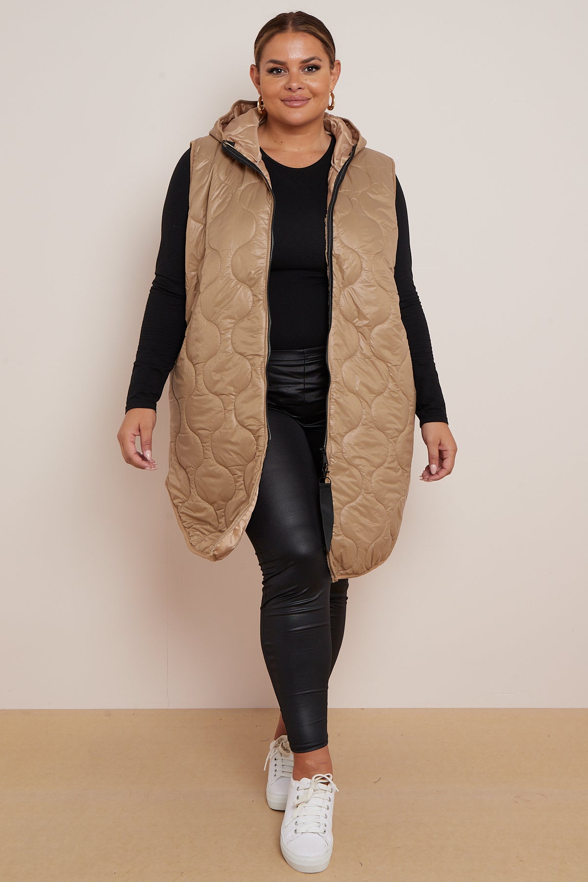 Lightweight padded gilet in beige with hood, available in sizes 8-24.