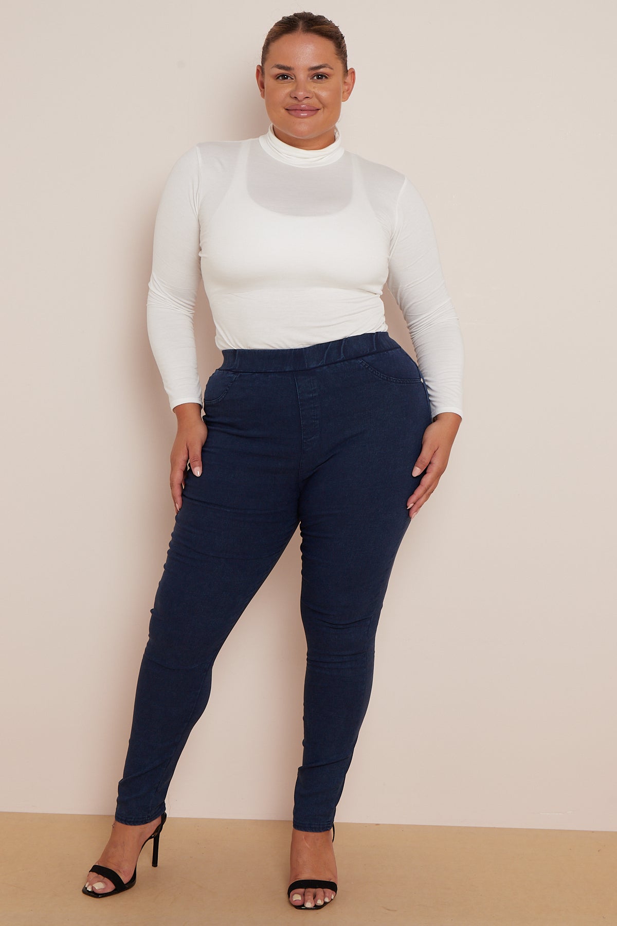 Plus-size woman wearing soft cotton jegging.