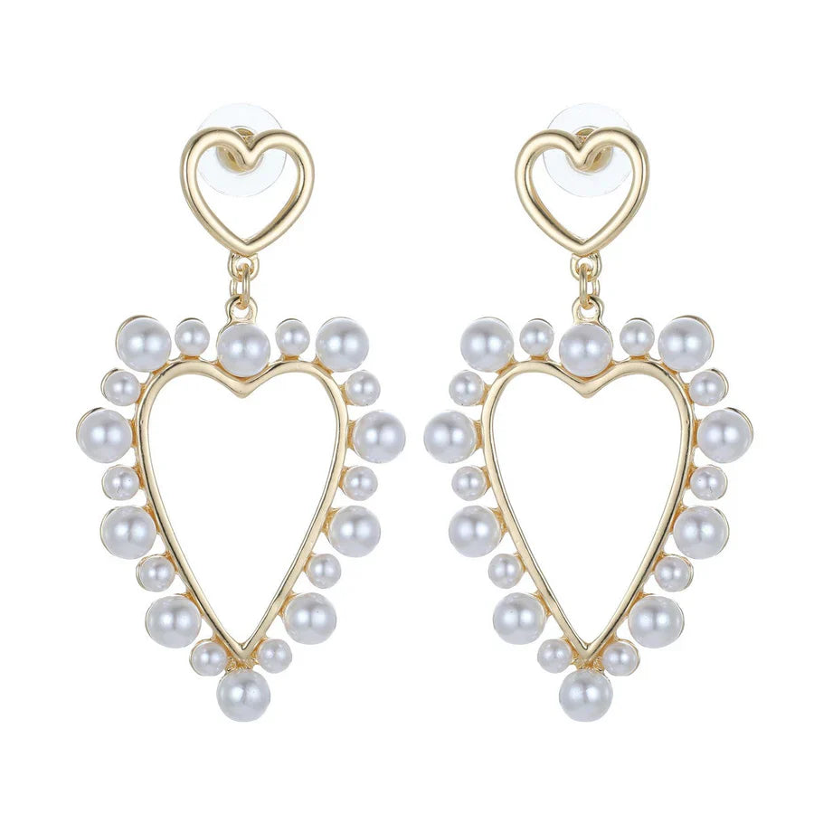 Heart-shaped pearl beads earrings with a small heart stud.