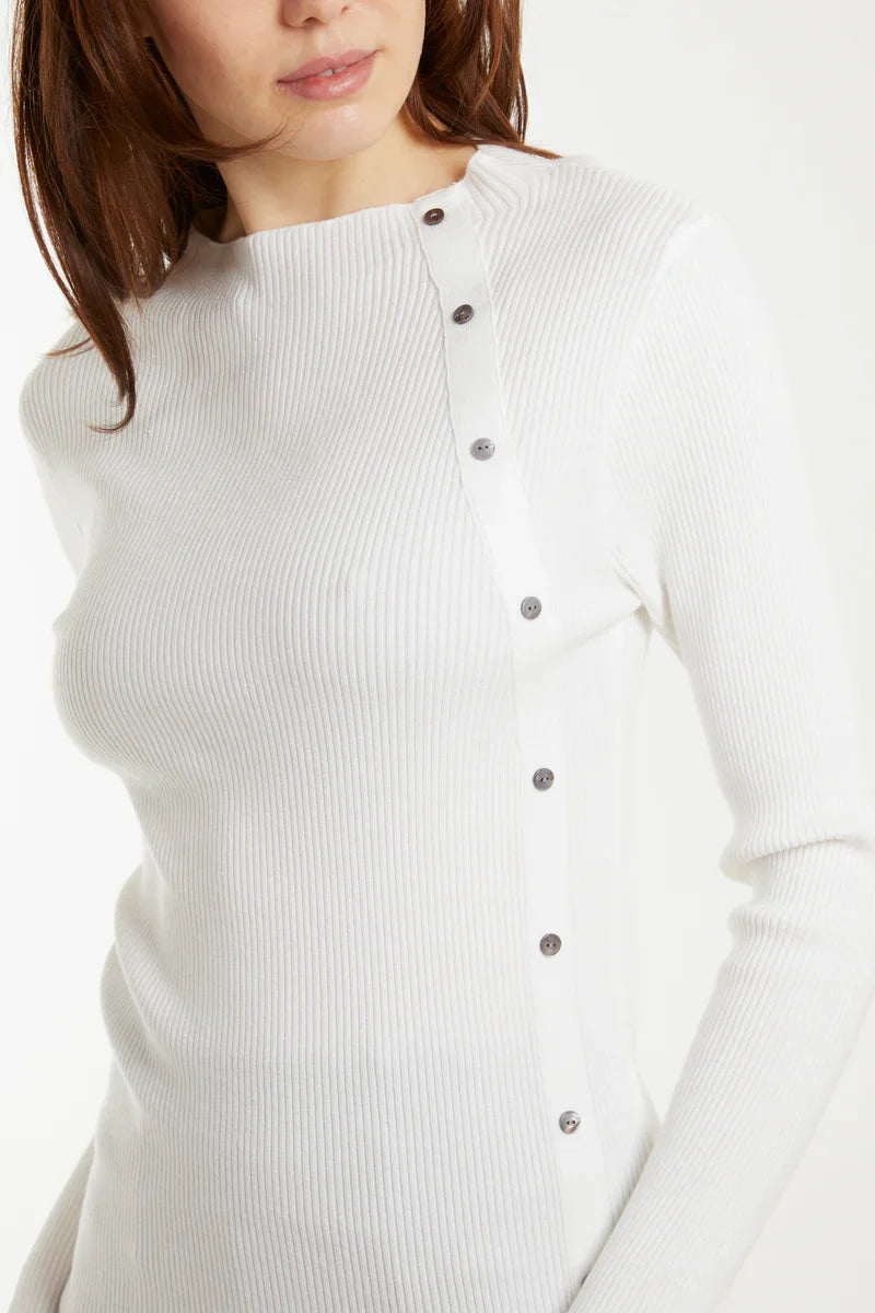 White button detail rib top with textured fabric and fitted silhouette.