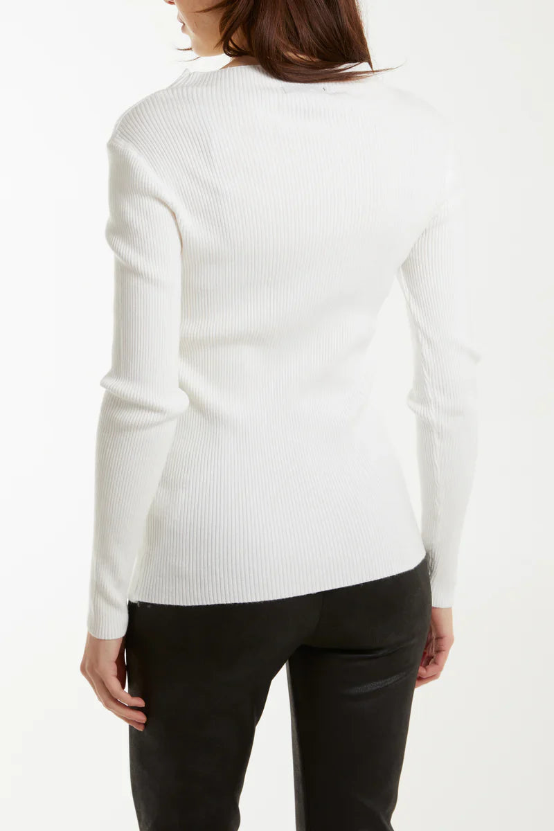 Button detail rib top with form-fitting silhouette and ribbed texture.