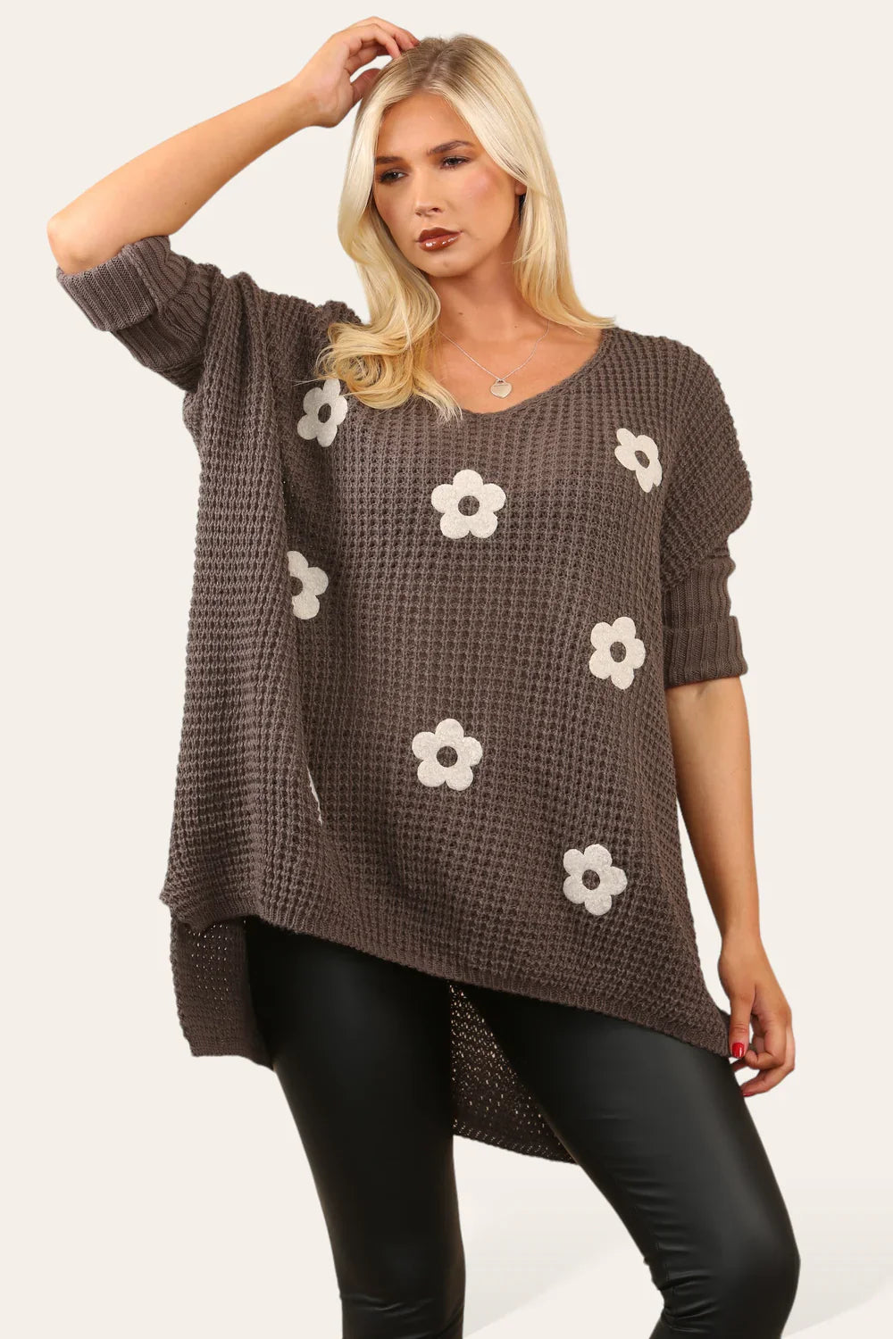 High Low Flower Knit Jumper with floral pattern and trendy high-low hem.