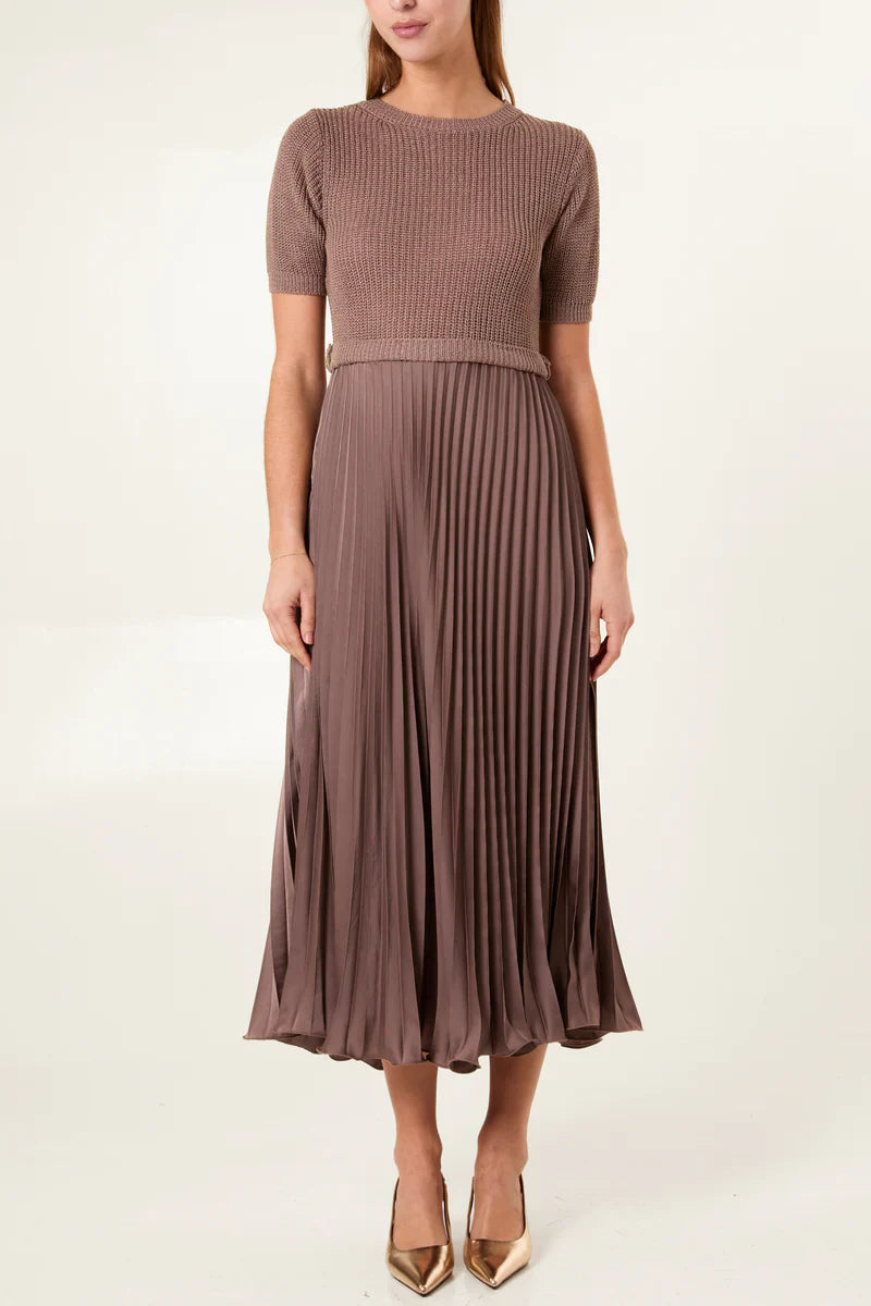 Short sleeve pleated jumper dress with knitted top and satin pleated skirt.