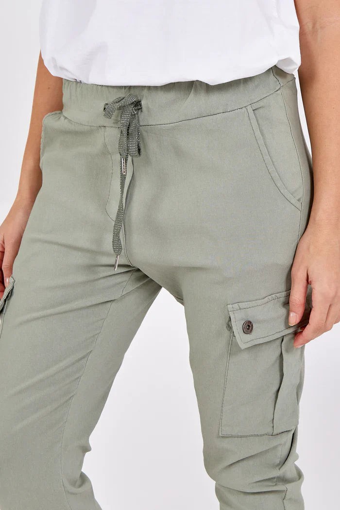 Magic Cargo Trousers in green fabric blend with drawstring waist and pockets.