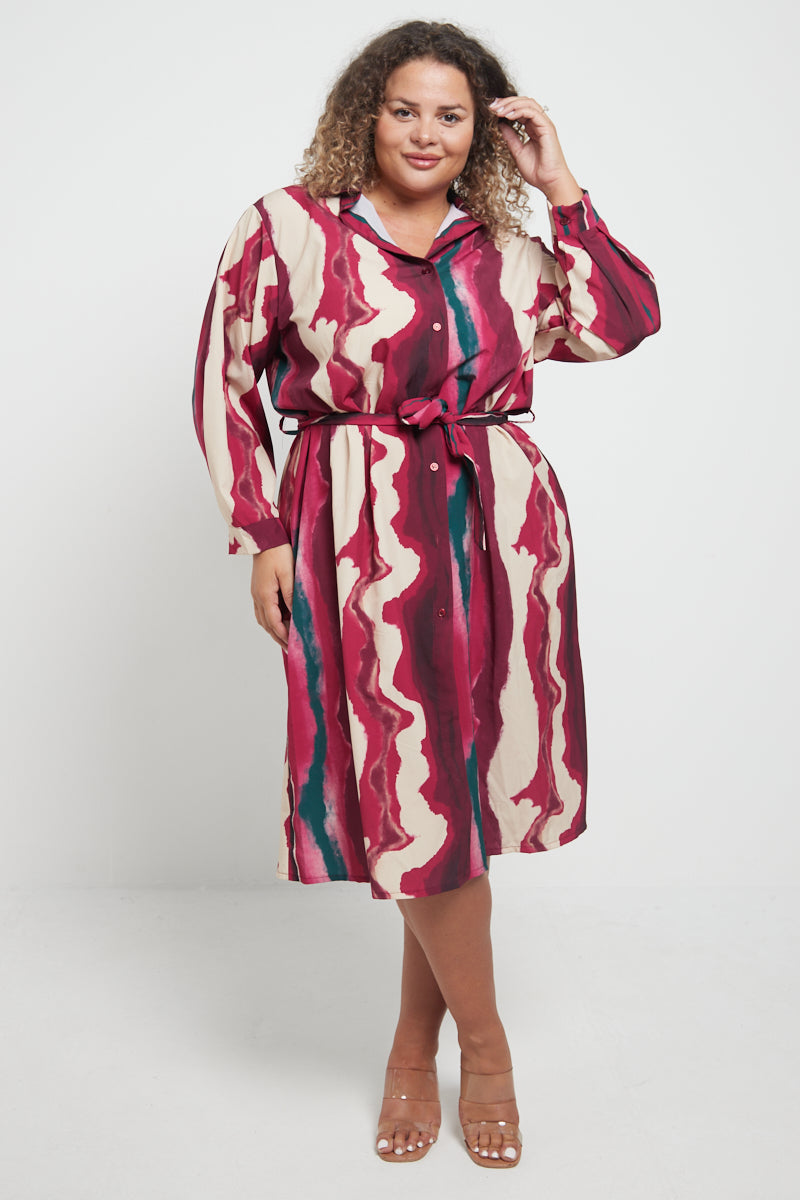 Wave Shirt Dress with abstract pattern in pink and teal, made from polyester and elastane.