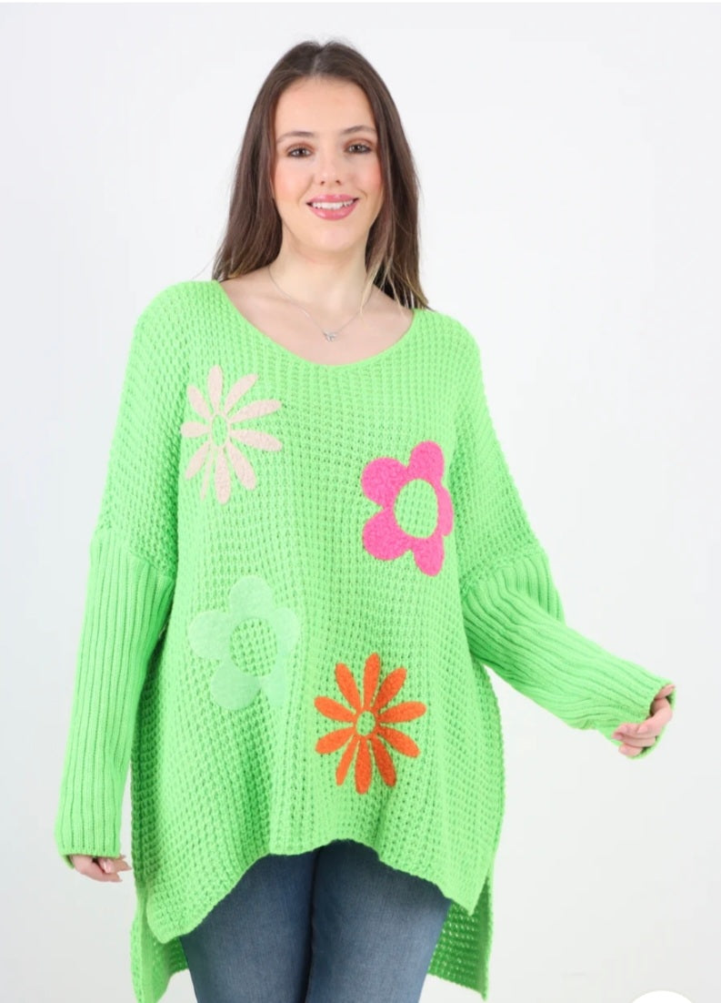 Side Slit Floral Jumper in green with colorful floral design, acrylic material.