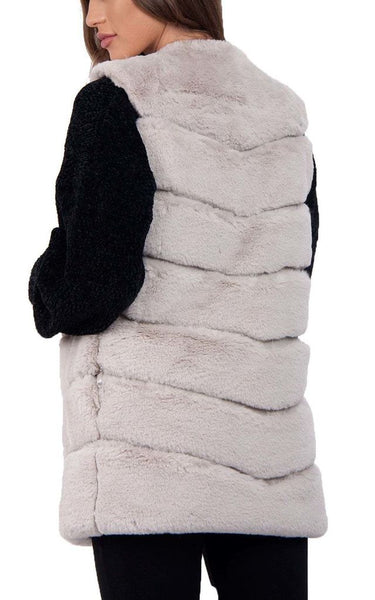 Ladies Faux Fur Gilet with silk and leather-look lining and pockets.