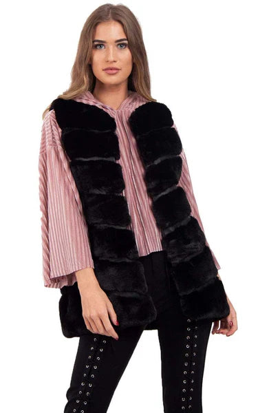 Ladies faux fur gilet with silk and leather look lining, featuring pockets and a slightly longer fit.