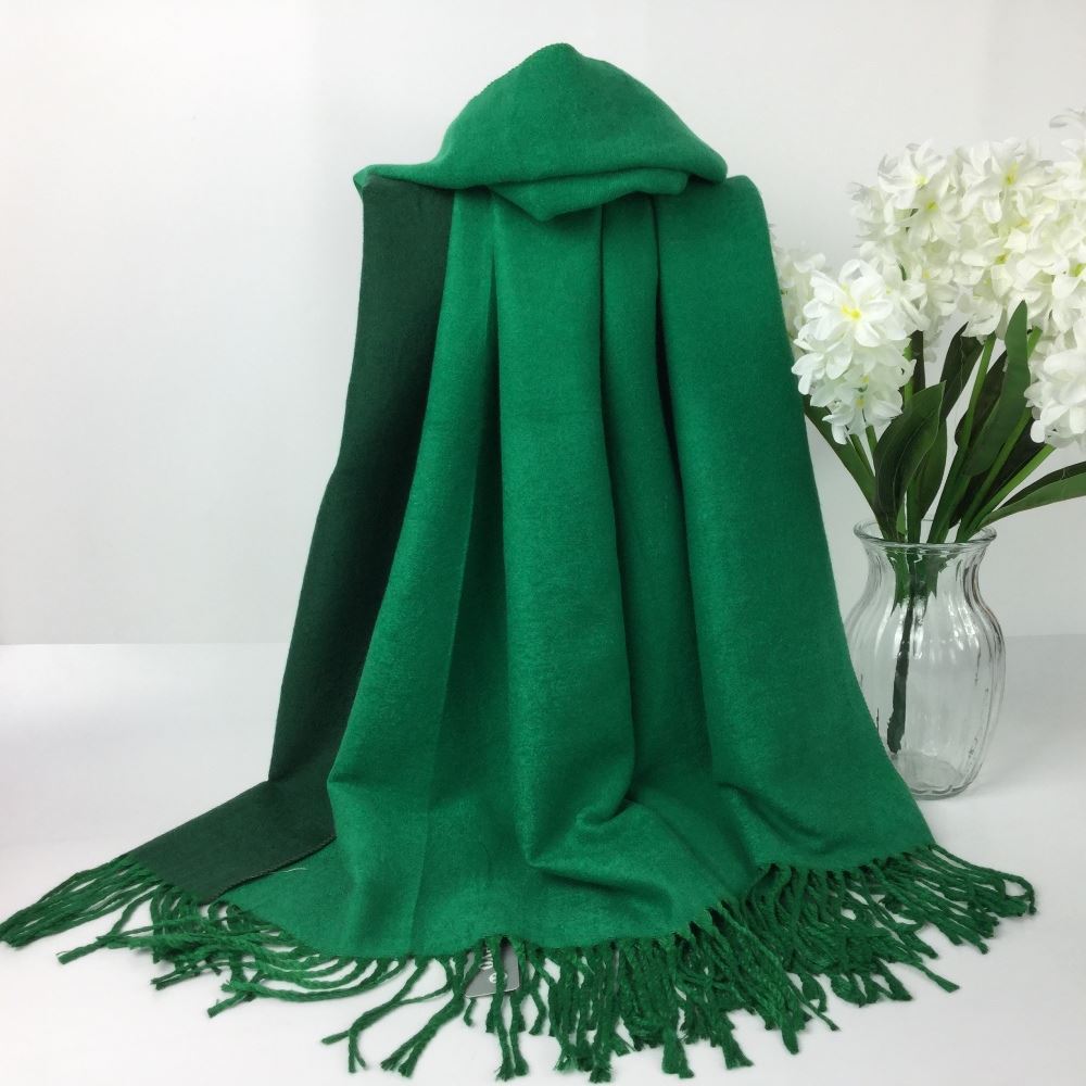 Green plain soft winter scarf made of 60% viscose and 40% polyester.