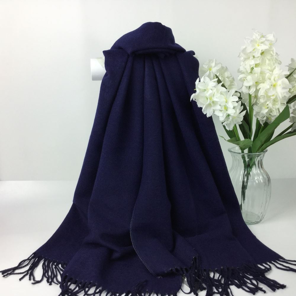 Plain soft winter scarf made of 60% viscose and 40% polyester.