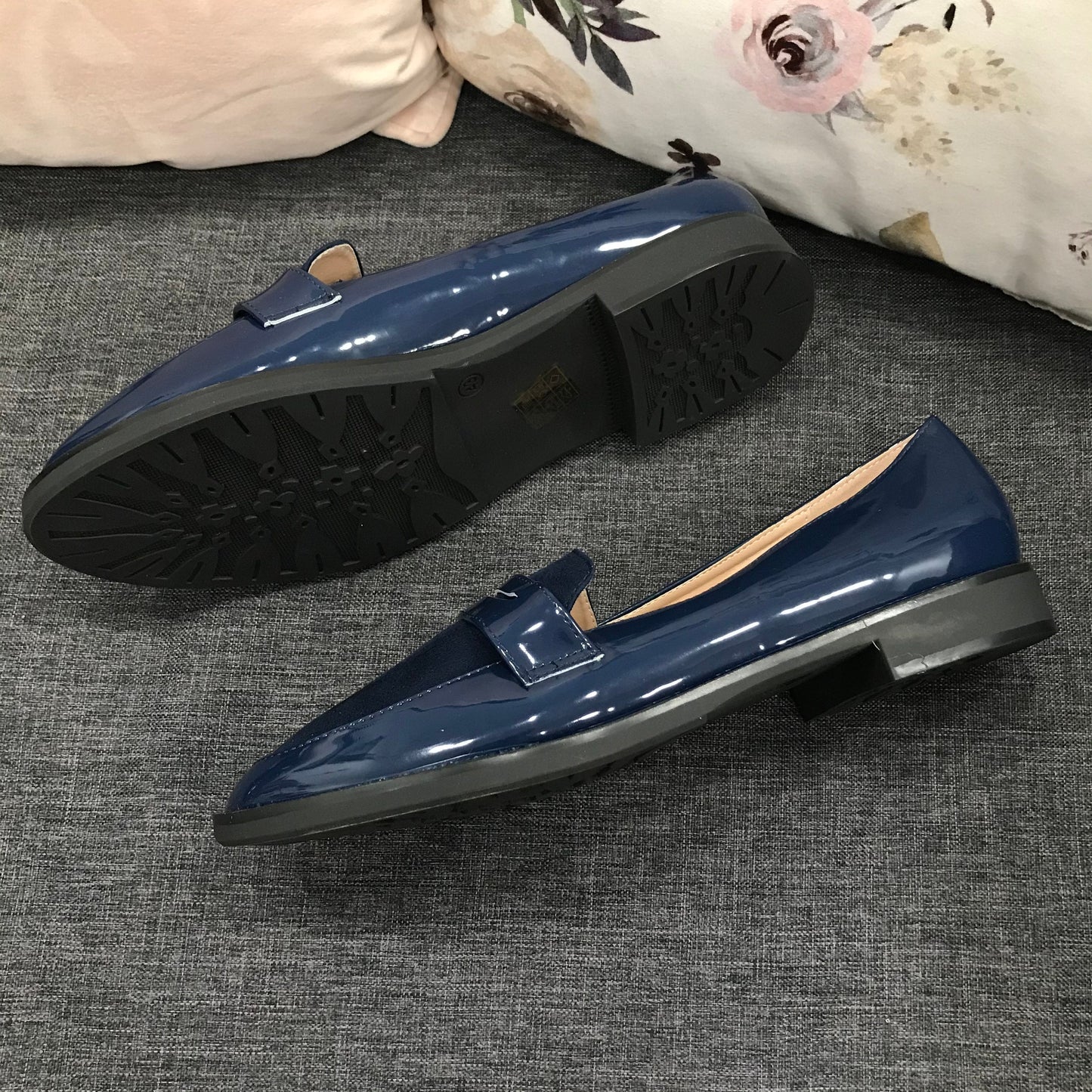 Larger size patent loafers in blue, suitable for smart casual wear.