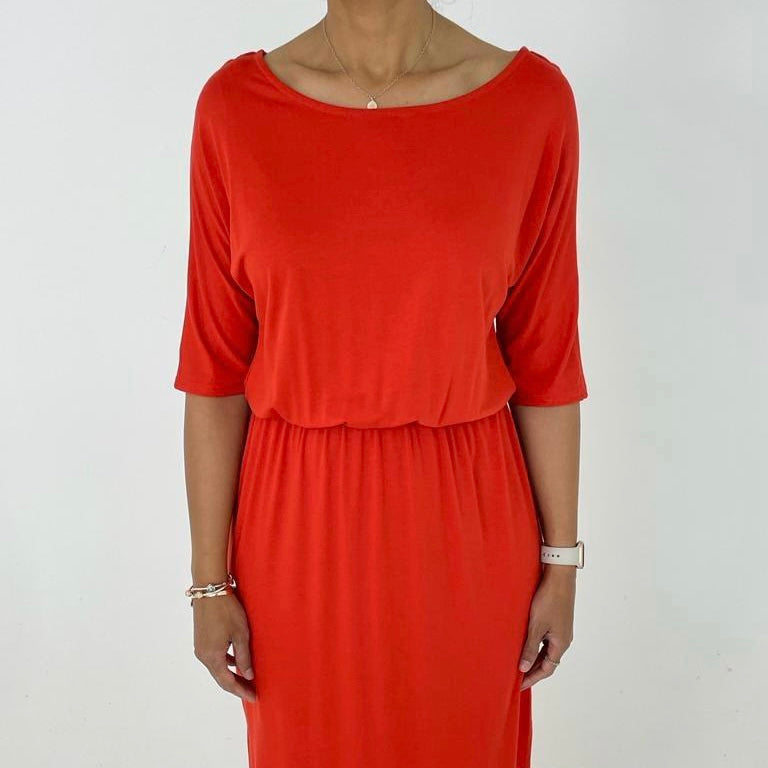 Plain TShirt Dress in vibrant red, versatile for casual or dressed-up looks.