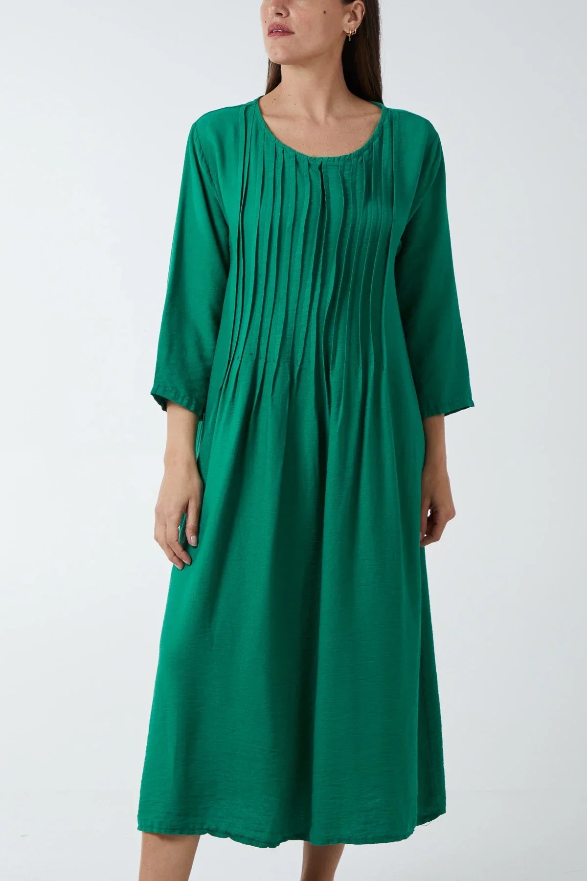 Pin-tuck Bodice Cotton Dress with three-quarter sleeves in green.