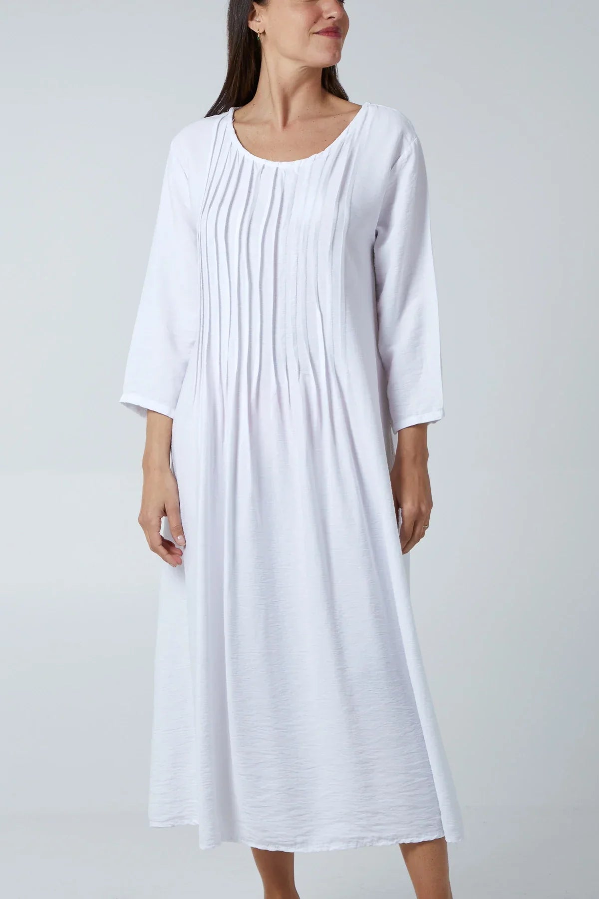 Pin-tuck Bodice Cotton Dress in white, casual or special occasion wear.