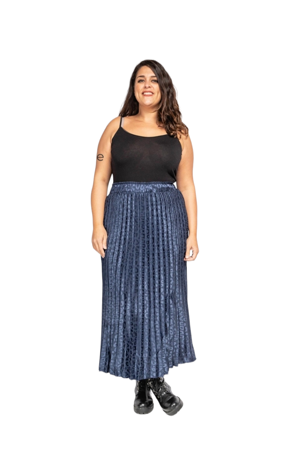 Animal print pleated skirt in navy and teal worn by a model.