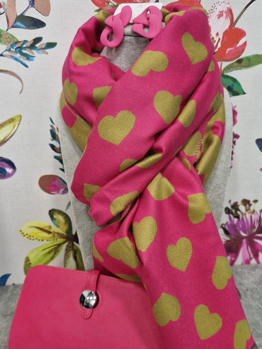 Reversible scarf with pink and green heart pattern, matching purse, and earrings.