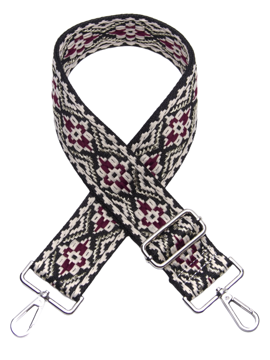 Embroidered wide bag strap with adjustable clips and intricate patterns.