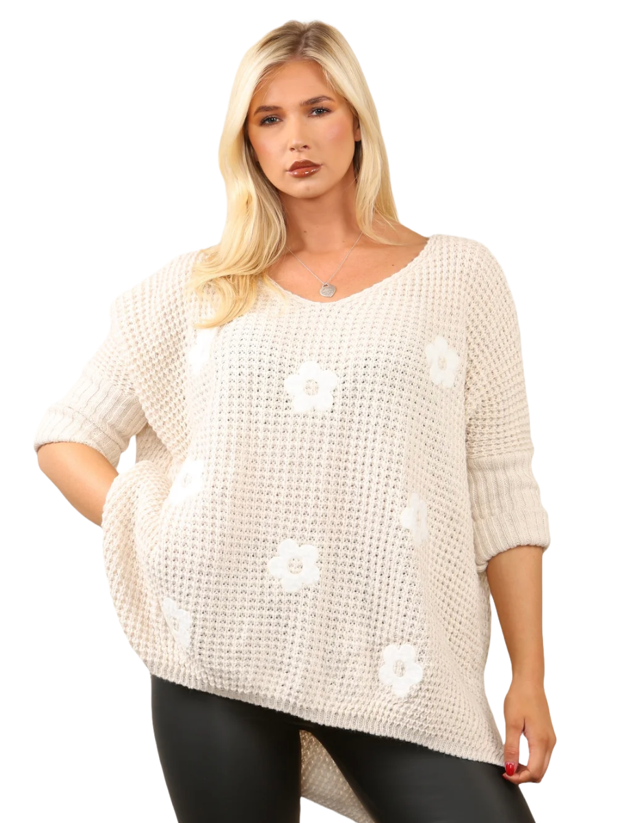 High Low Flower Knit Jumper with floral detail and trendy hem.