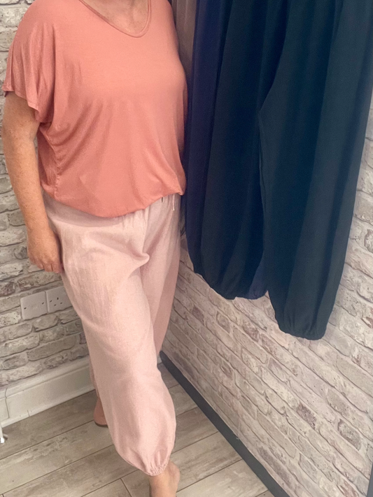 Plus size harem trousers in cotton and linen with drawstring waist and ankle cuffs.