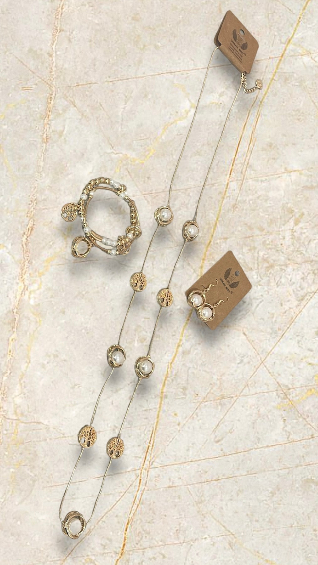 Tree and Pearl Jewellery Set featuring necklace, stretch bracelet, and earrings in silver or gold effect.