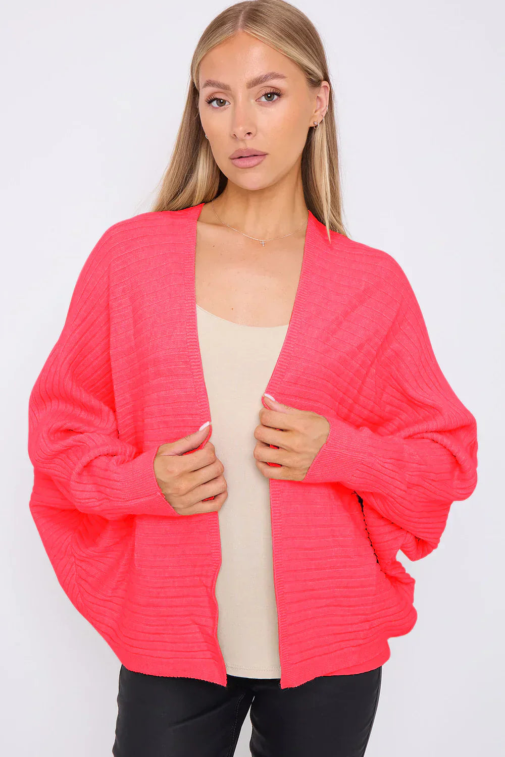 Ribbed batwing cardigan with open front and batwing sleeves in vibrant color.