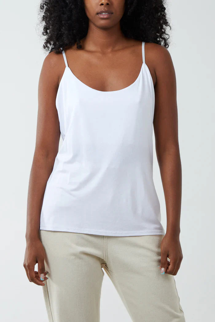 Lined adjustable cami vest with adjustable straps and viscose lining for comfort.