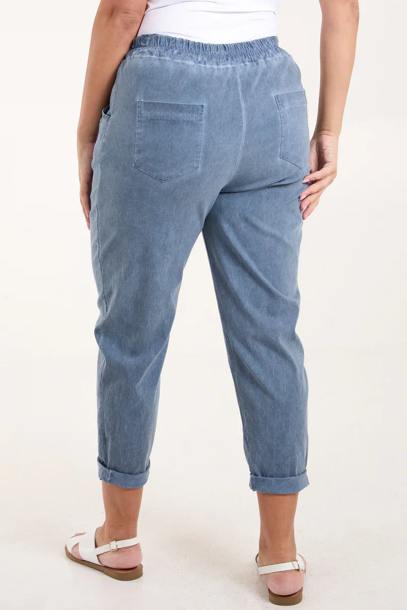 Washed Relaxed Fit Magic Trousers with vintage look and comfortable design.