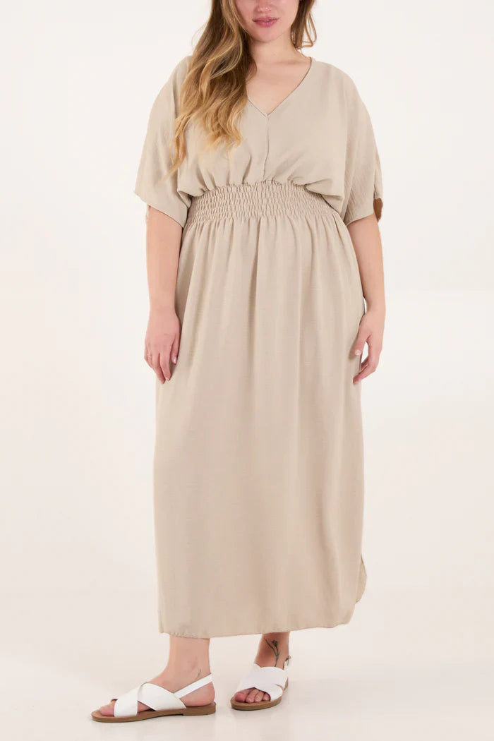 V Neck Shirred Waist Dress in beige, featuring 60% polyester, 35% viscose, 5% elastane blend.