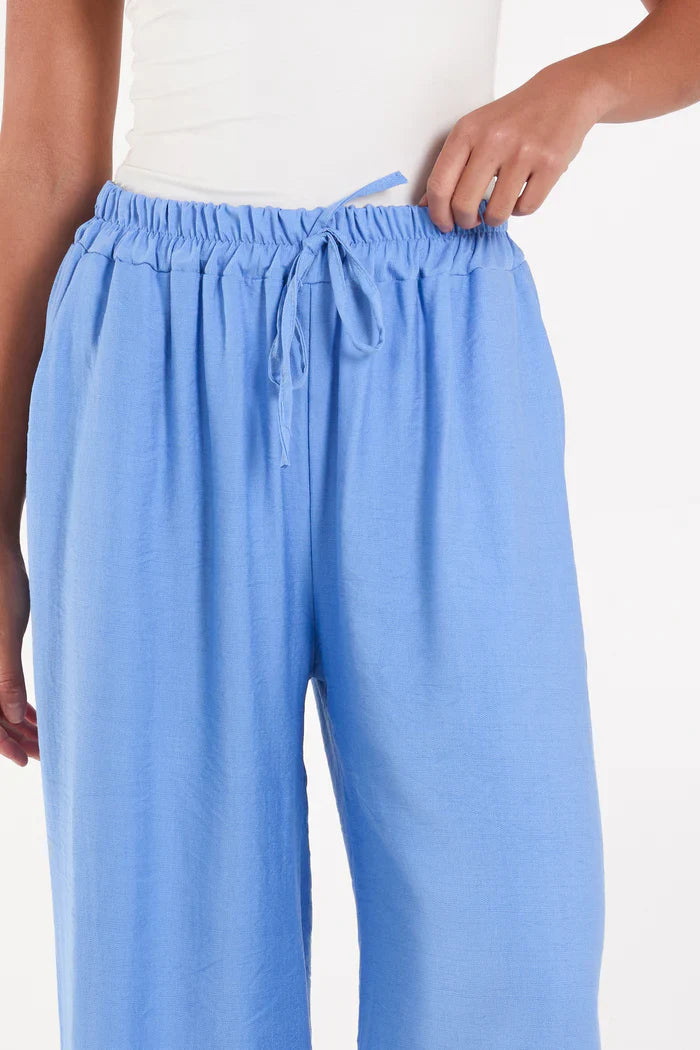 Blue wide leg crepe trousers made of 100% viscose.