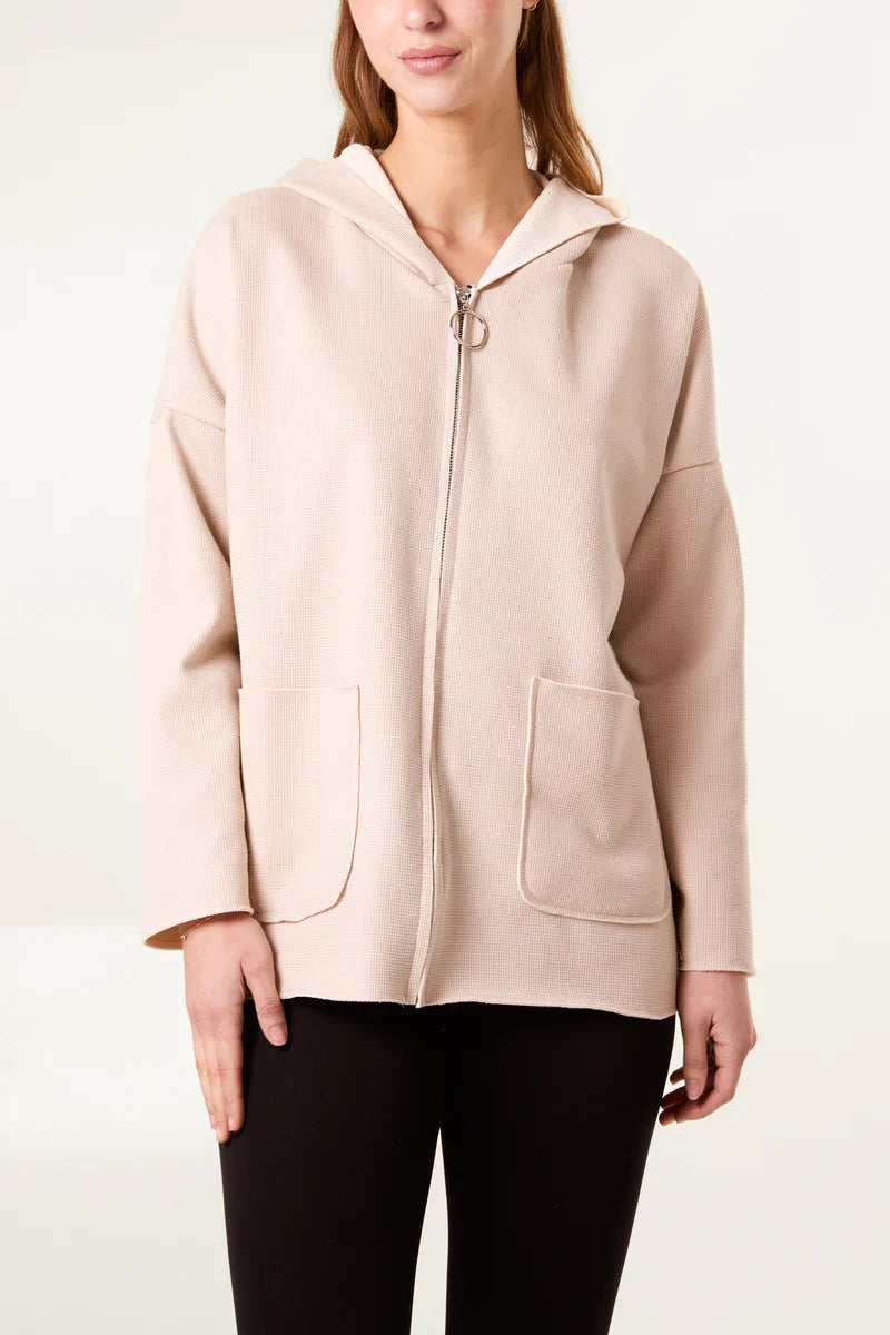 Textured jersey zip-up hoodie with fleece lining and contrast detail.