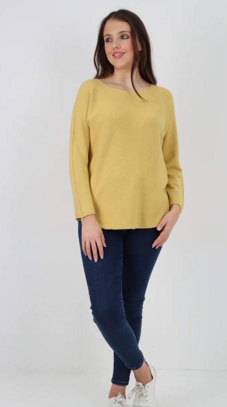 Round Neck Raw Edge Jumper in yellow with a relaxed, textured feel.