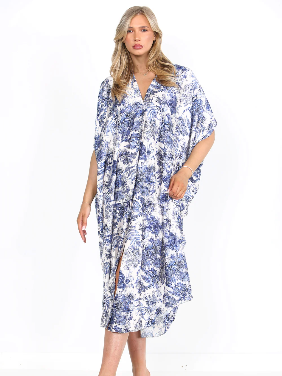 Leaf print shirt dress in blue and white, 100% polyester.